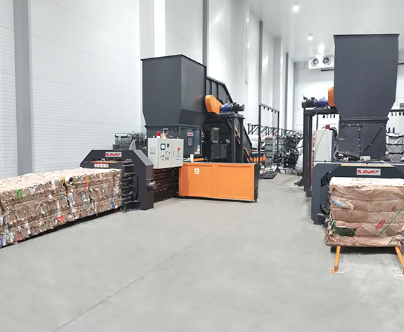 Automaattinen pakkausjätteen hävitysratkaisu Venäjän johtavassa supermarketin logistiikkakeskuksessa